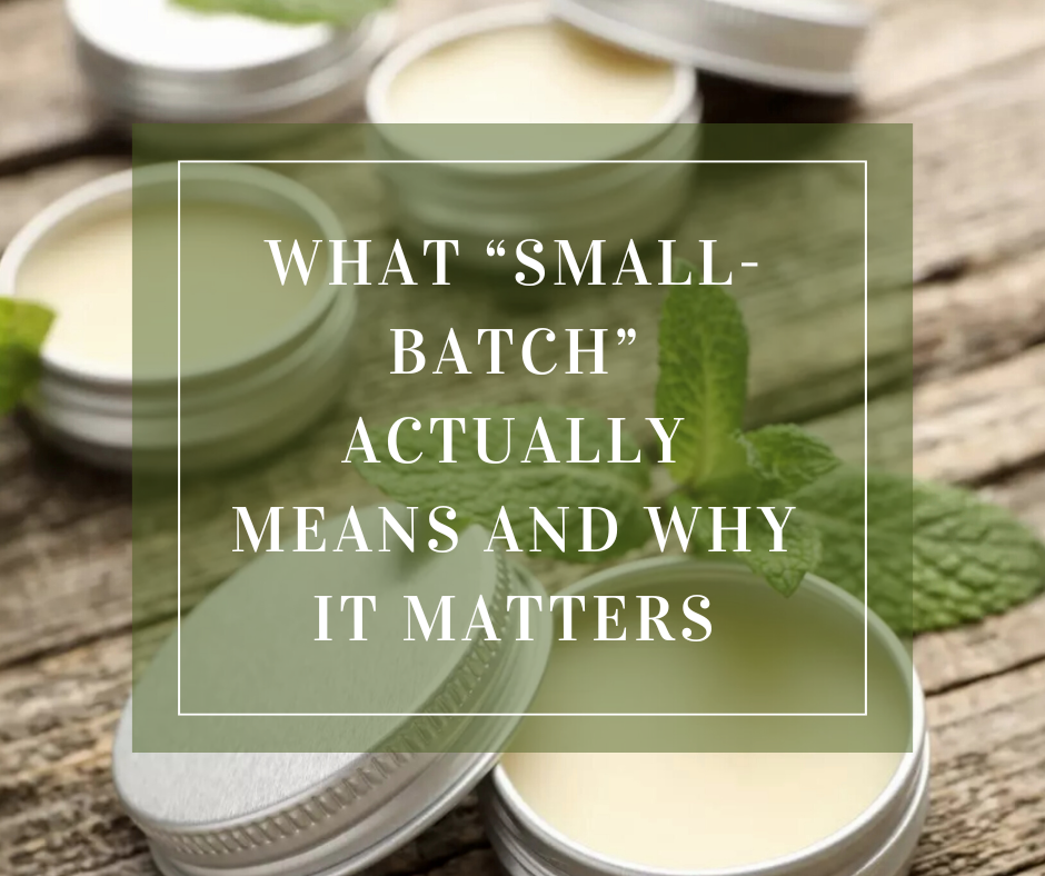 Rustic table with tins and mint writing that says what small batch actually means and why it matters
