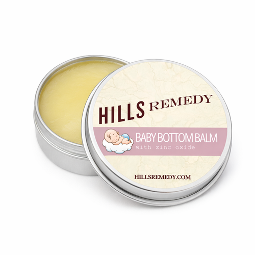 Hills Remedy Baby Bottom Balm in a metal tin on a white background