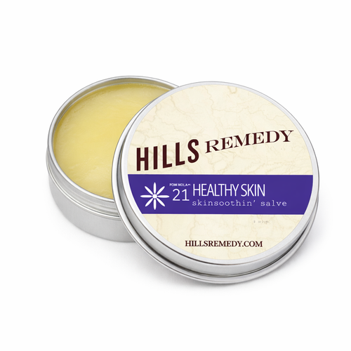 Hills Remedy skin soothing salve in a metal tin with a white background