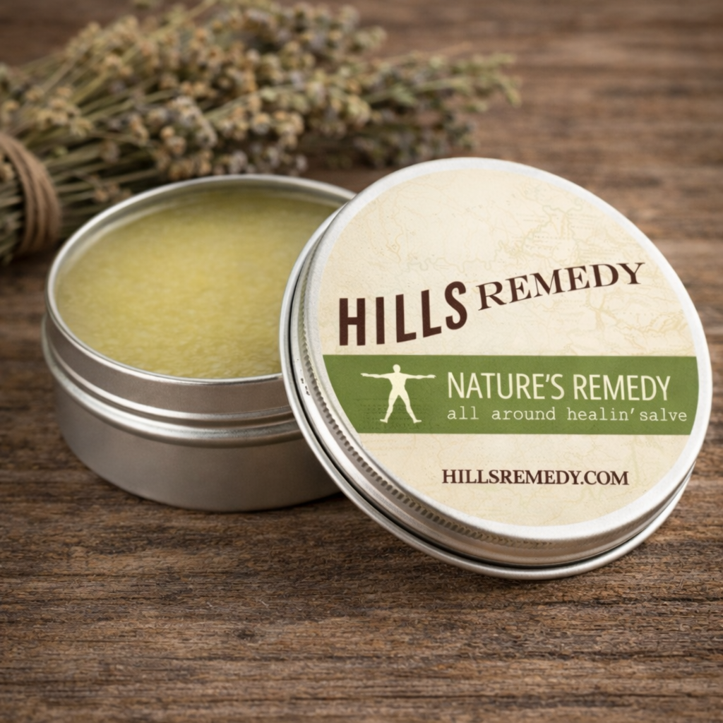 Hills Remedy salve tin with open lid on a wooden surface