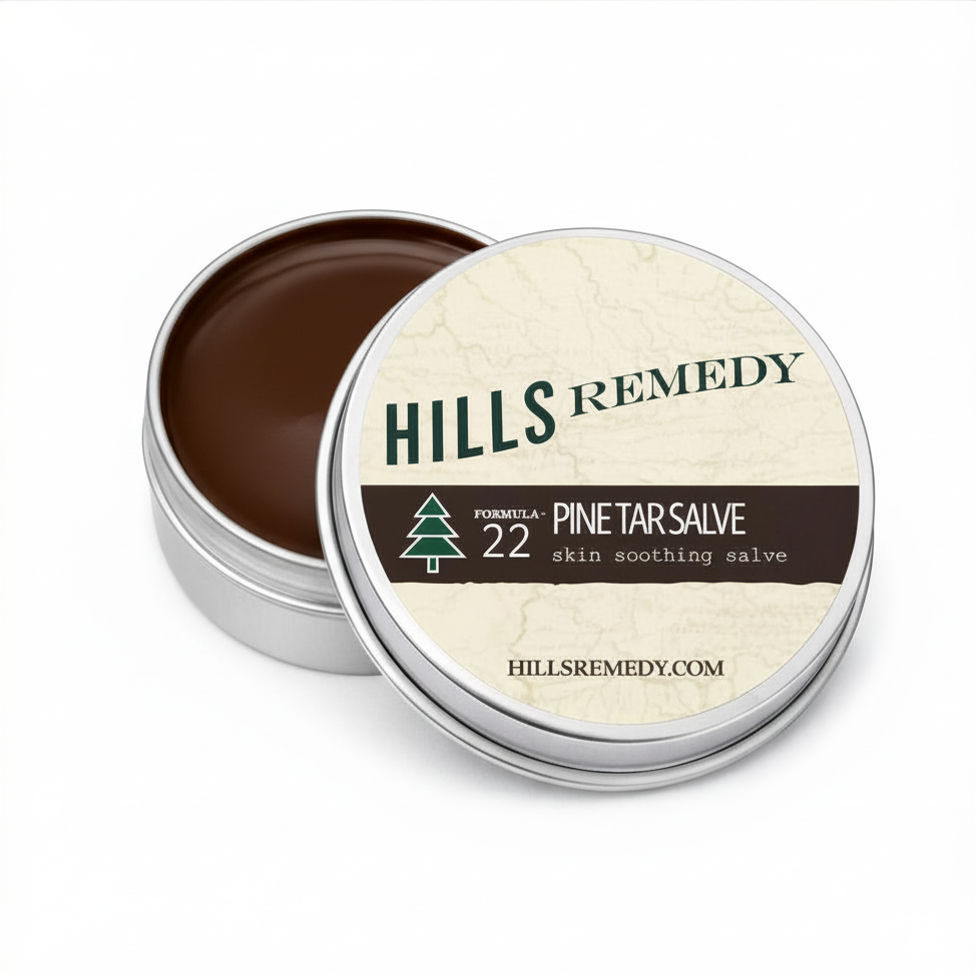 Hills Remedy Pine Tar Salve in a metal tin on a white background
