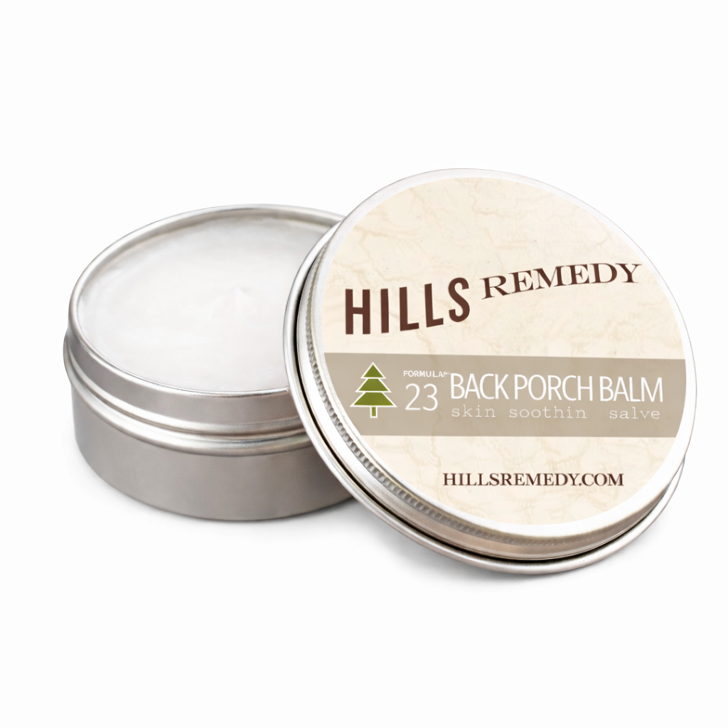 Hills Remedy Back Porch Balm tin with lid off on a white background